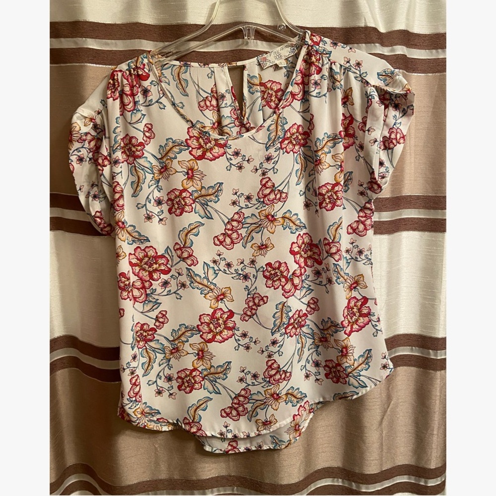 Floral shirt.